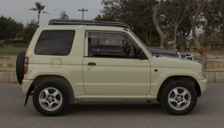 Illustration for article titled 660cc Mini Pajero: Unusually, Adding A Turbo Makes It Worse